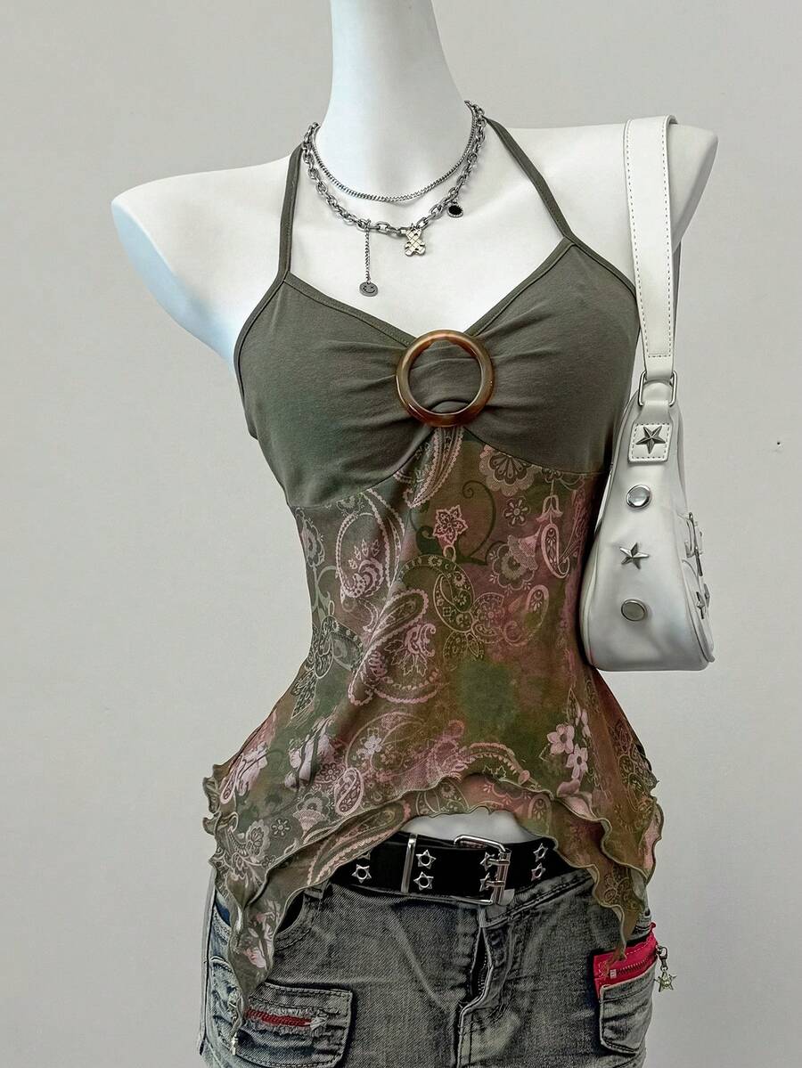 Women's backless halter cami top featuring a paisley print, sleeveless design, and an asymmetrical hem in knitted fabric.