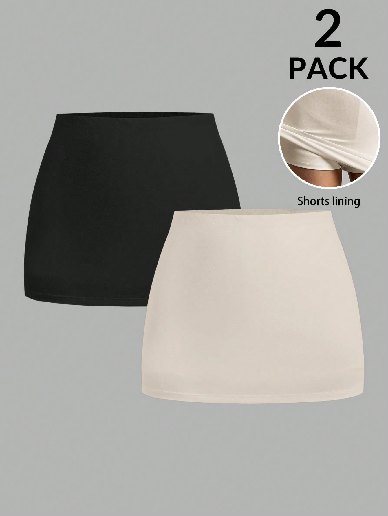 Women's black casual low rise bodycon mini skort with built-in shorts in knitted plain stretch fabric.
