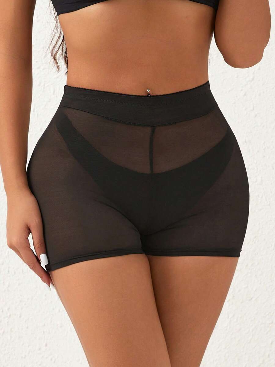 Apricot high-waist seamless butt lifting shapewear shorts with removable foam padding for women.