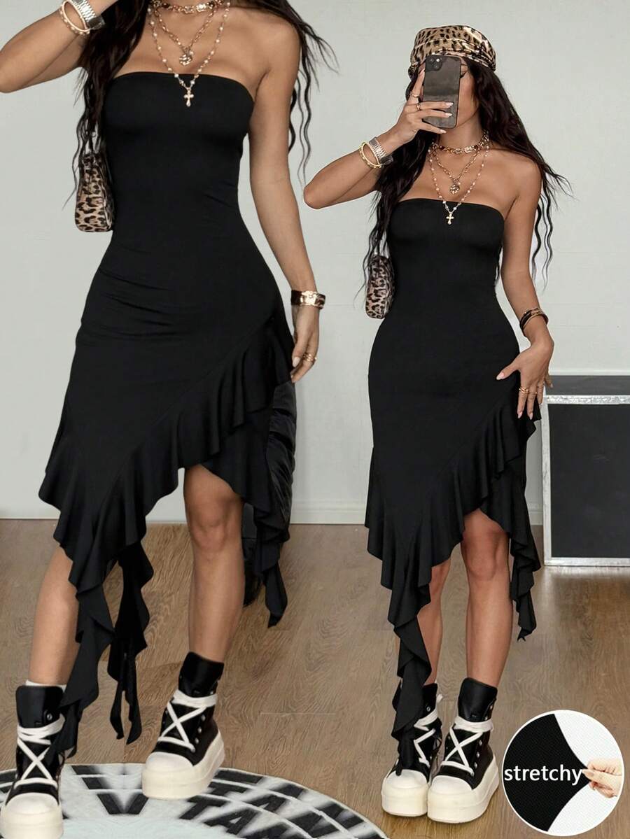 Women's strapless black bandeau midi dress featuring an asymmetrical ruffle hem and a slim fit bodycon silhouette.
