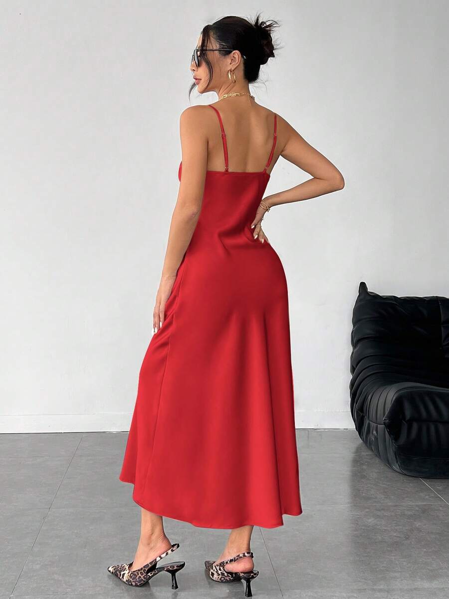 Women's long apricot satin cami dress featuring a draped swing collar, spaghetti straps, backless zipper back, and mermaid hem.