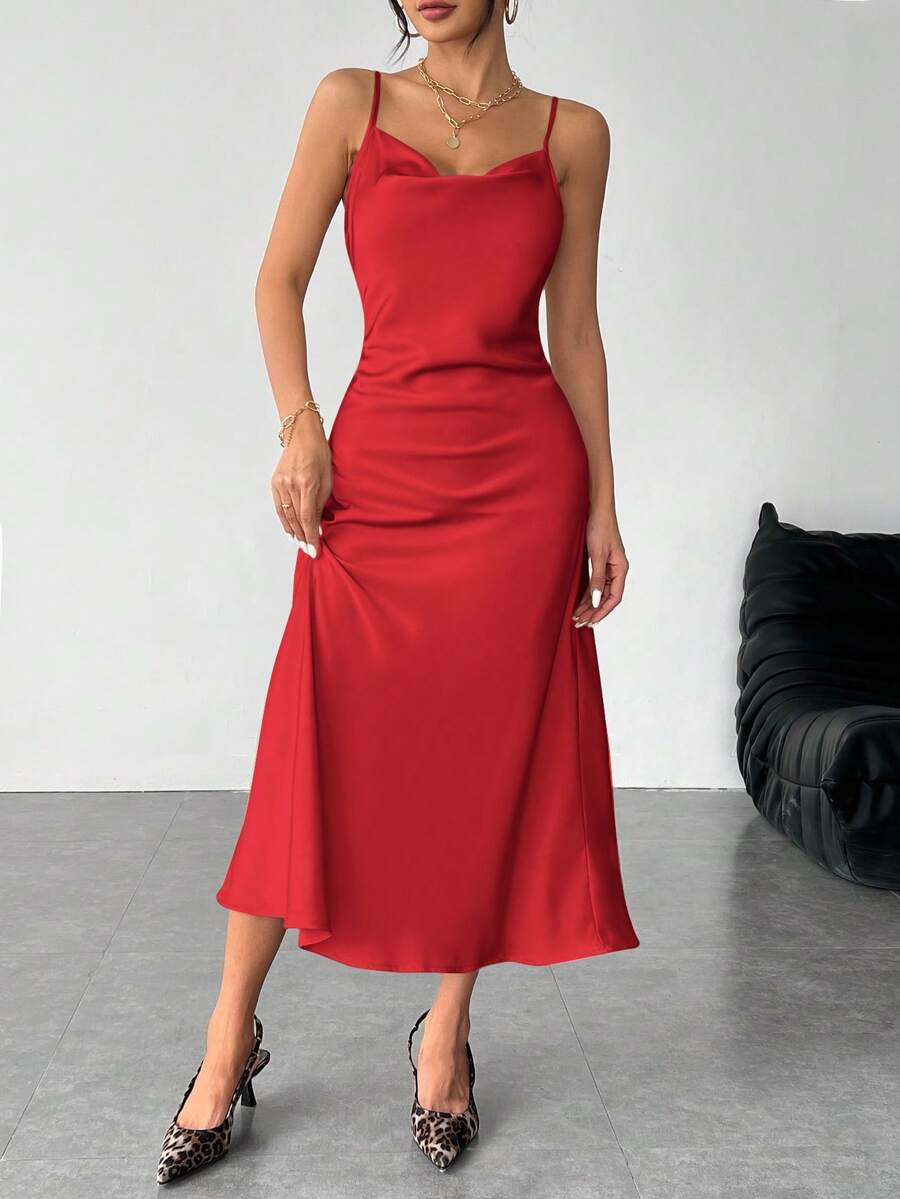 Women's long apricot satin cami dress featuring a draped swing collar, spaghetti straps, backless zipper back, and mermaid hem.