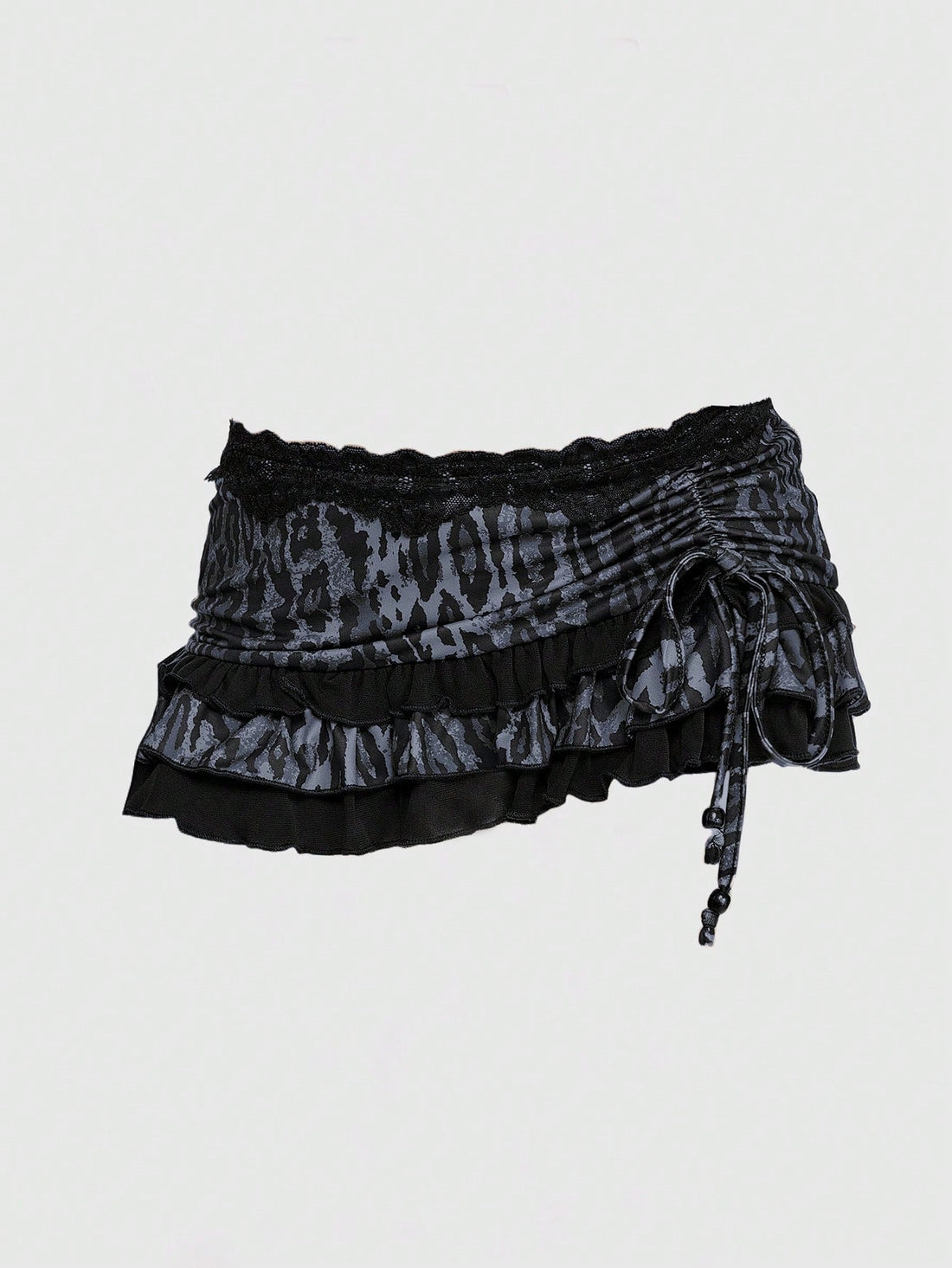 Black ultra low waist ruched ruffle mini skirt for women with drawstring details and high stretch knitted fabric.
