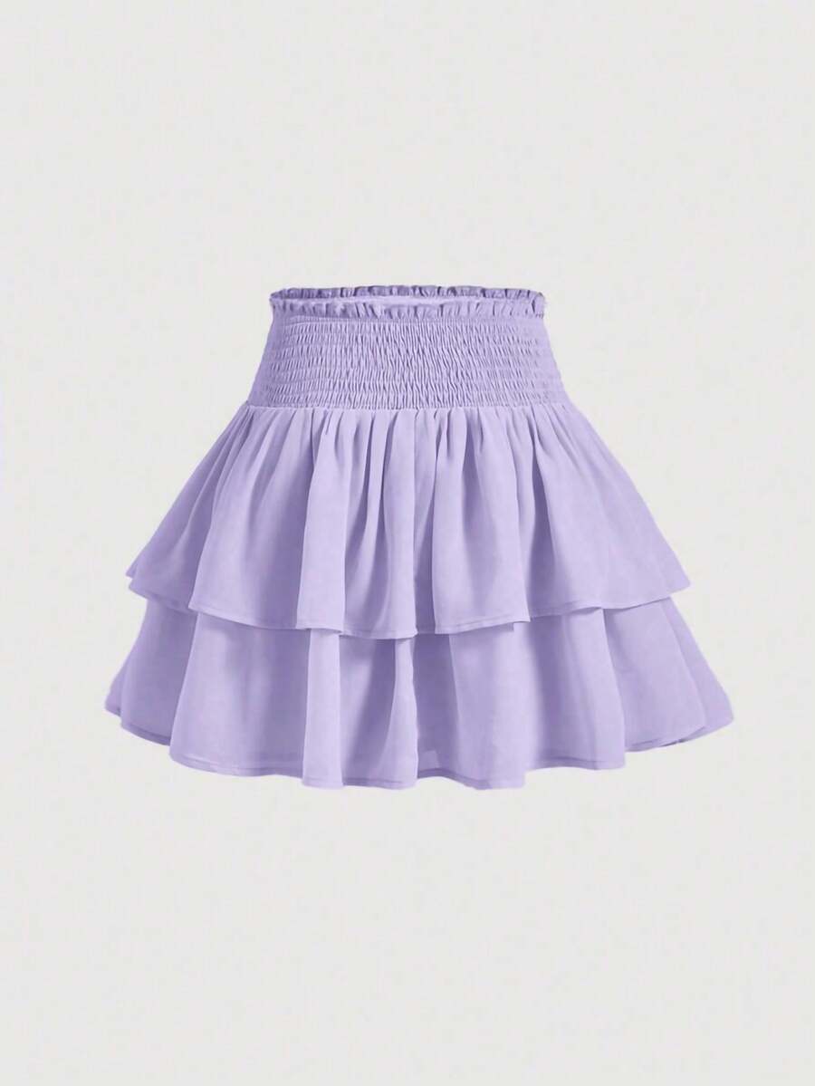 Women's high waist tiered ruffle layered mini skort in black featuring shirred details and ruffle hem.