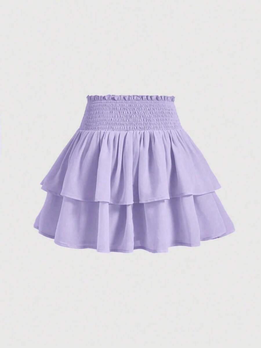 Women's high waist tiered ruffle layered mini skort in black featuring shirred details and ruffle hem.