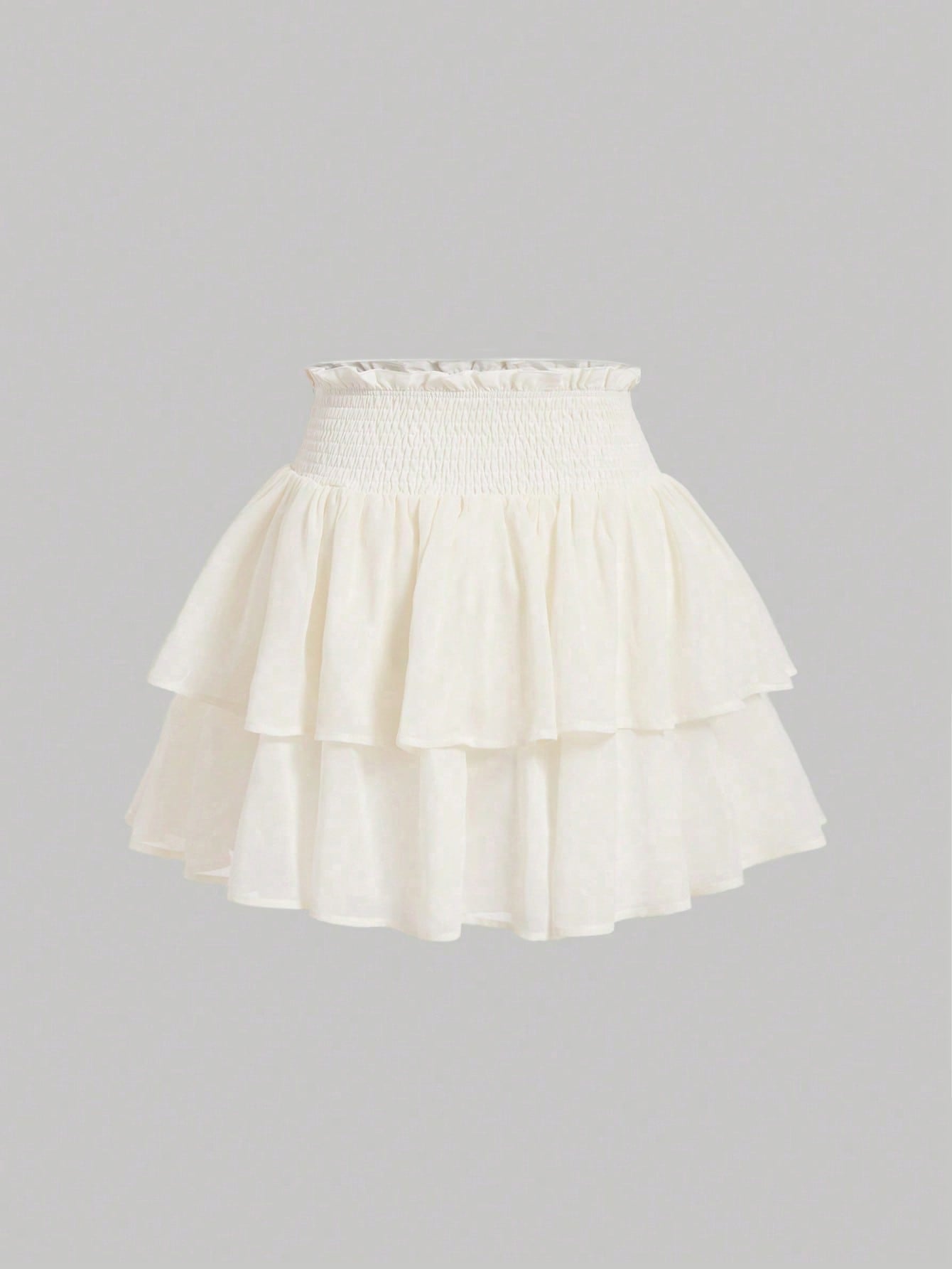 Women's high waist tiered ruffle layered mini skort in black featuring shirred details and ruffle hem.