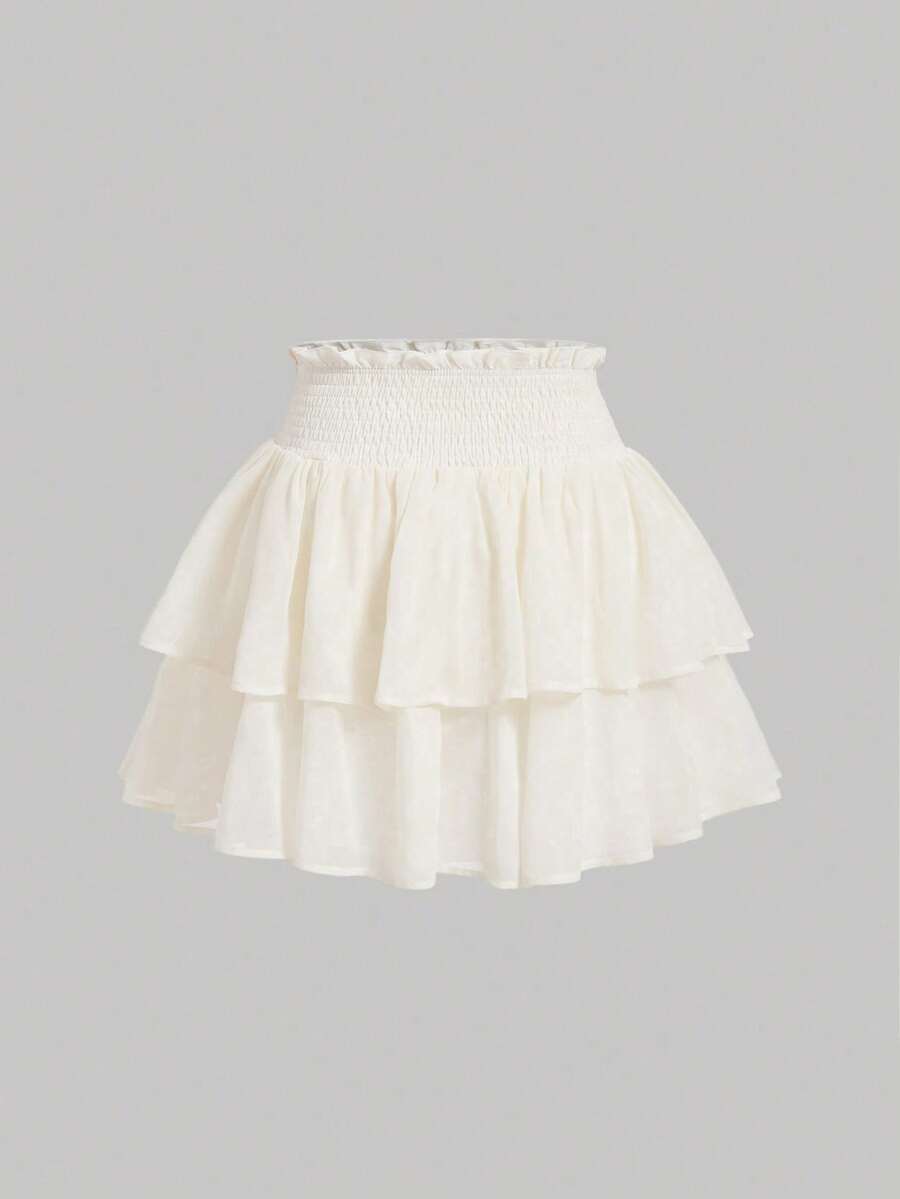 Women's high waist tiered ruffle layered mini skort in black featuring shirred details and ruffle hem.