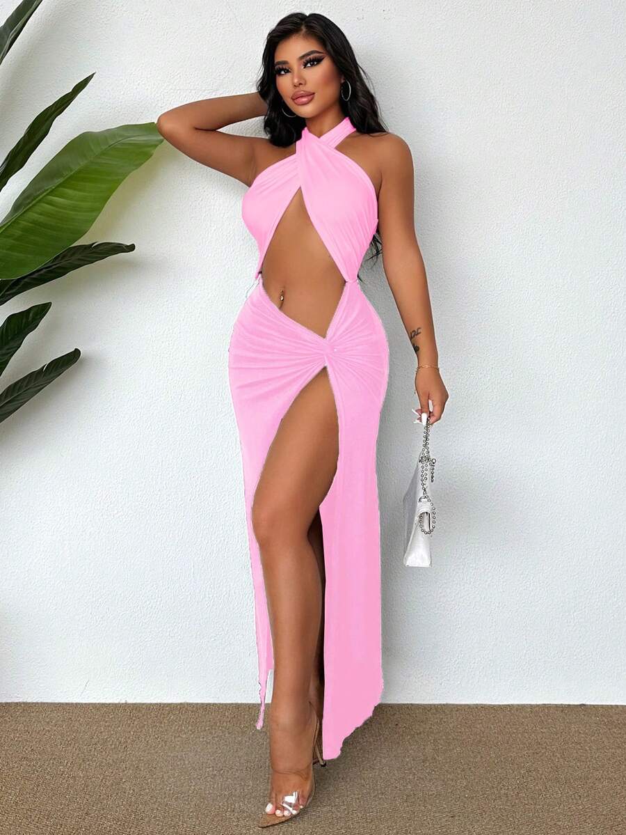 Sleeveless halter neck cut out maxi dress featuring a twist front, backless crisscross design, and split thigh slit.