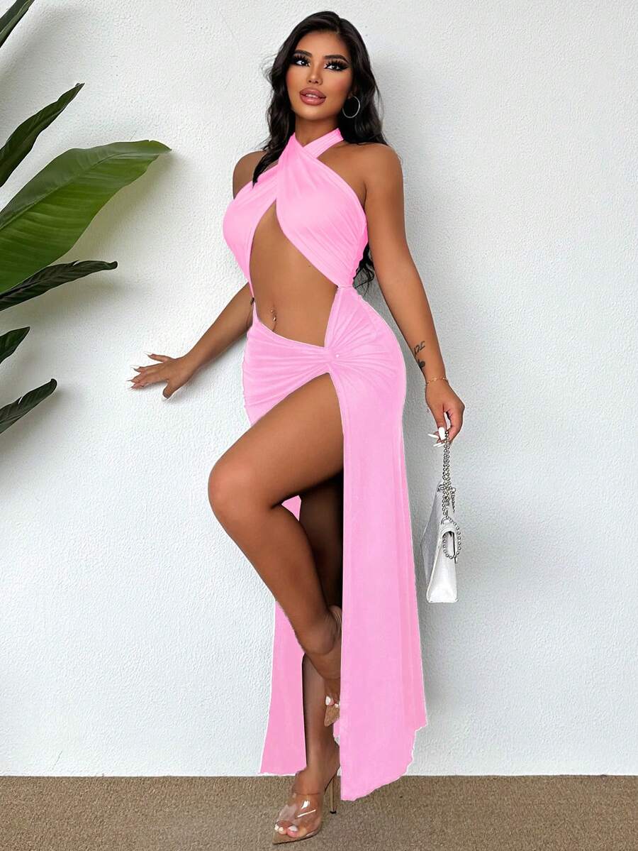 Sleeveless halter neck cut out maxi dress featuring a twist front, backless crisscross design, and split thigh slit.