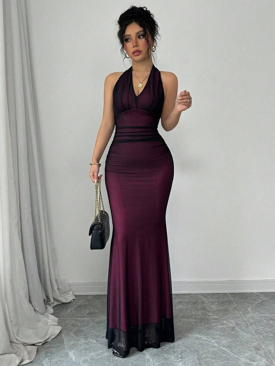 Women's long sleeve mermaid bodycon dress in high-stretch mesh fabric featuring a halter backless neckline, ruched high waist, and slim fit silhouette for formal evening wear.