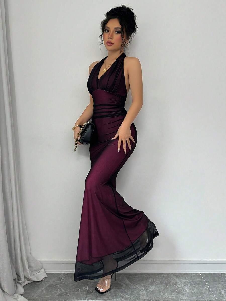 Women's long sleeve mermaid bodycon dress in high-stretch mesh fabric featuring a halter backless neckline, ruched high waist, and slim fit silhouette for formal evening wear.