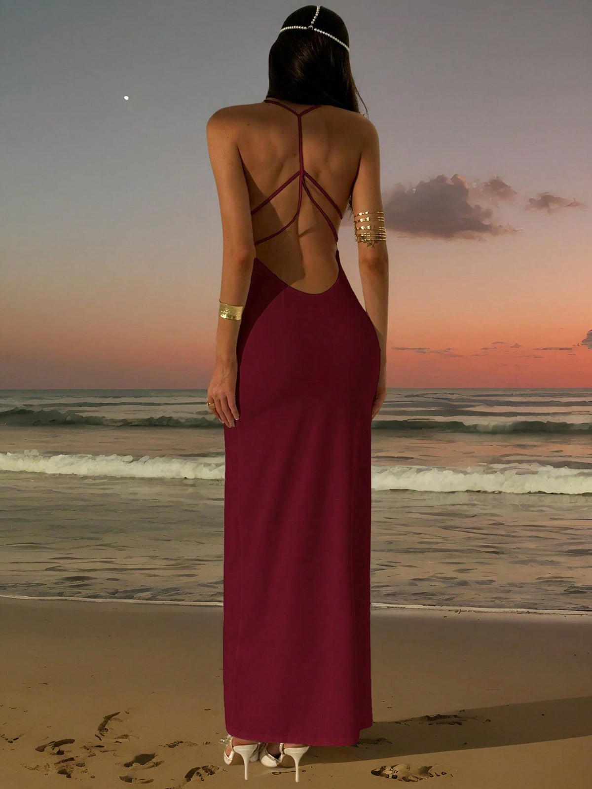 Slim fit backless halter maxi dress for women featuring criss-cross back details and spaghetti straps.