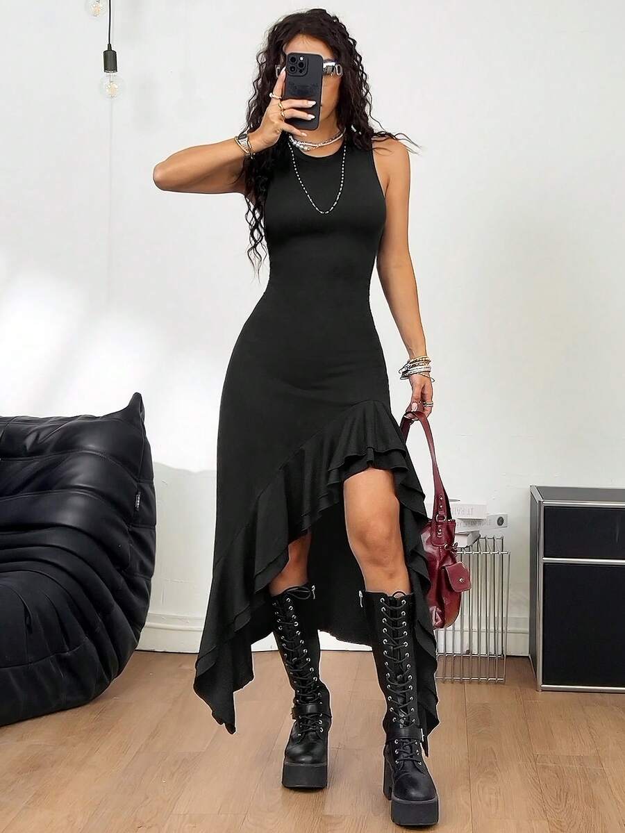 Women wearing a sleeveless army green long dress with a round neck and asymmetrical ruffle hem.