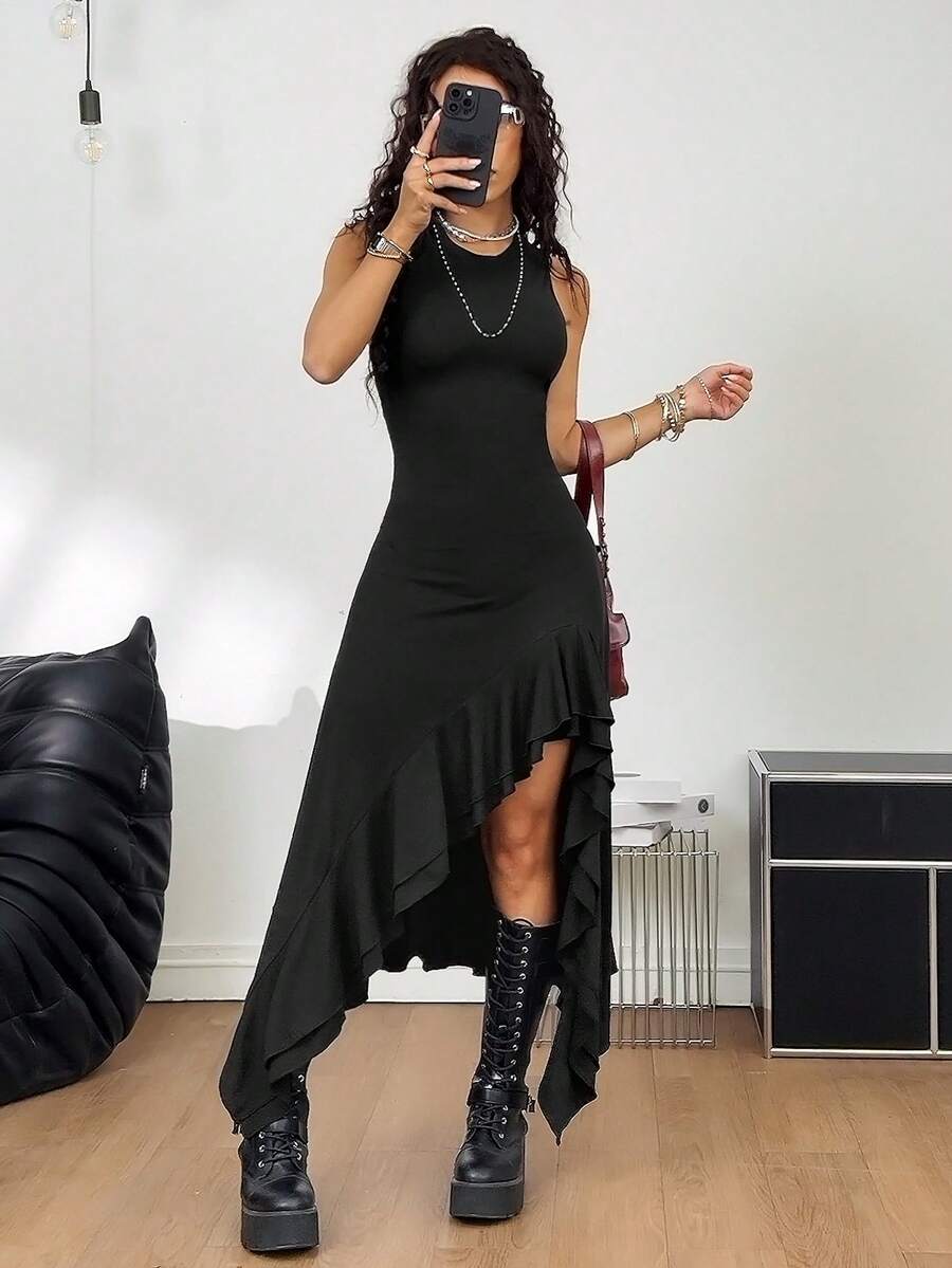 Women wearing a sleeveless army green long dress with a round neck and asymmetrical ruffle hem.