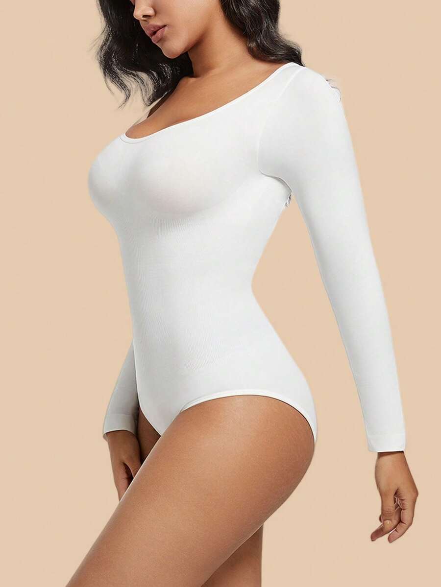 Women's black seamless bodysuit shapewear with tummy control and butt lift design.