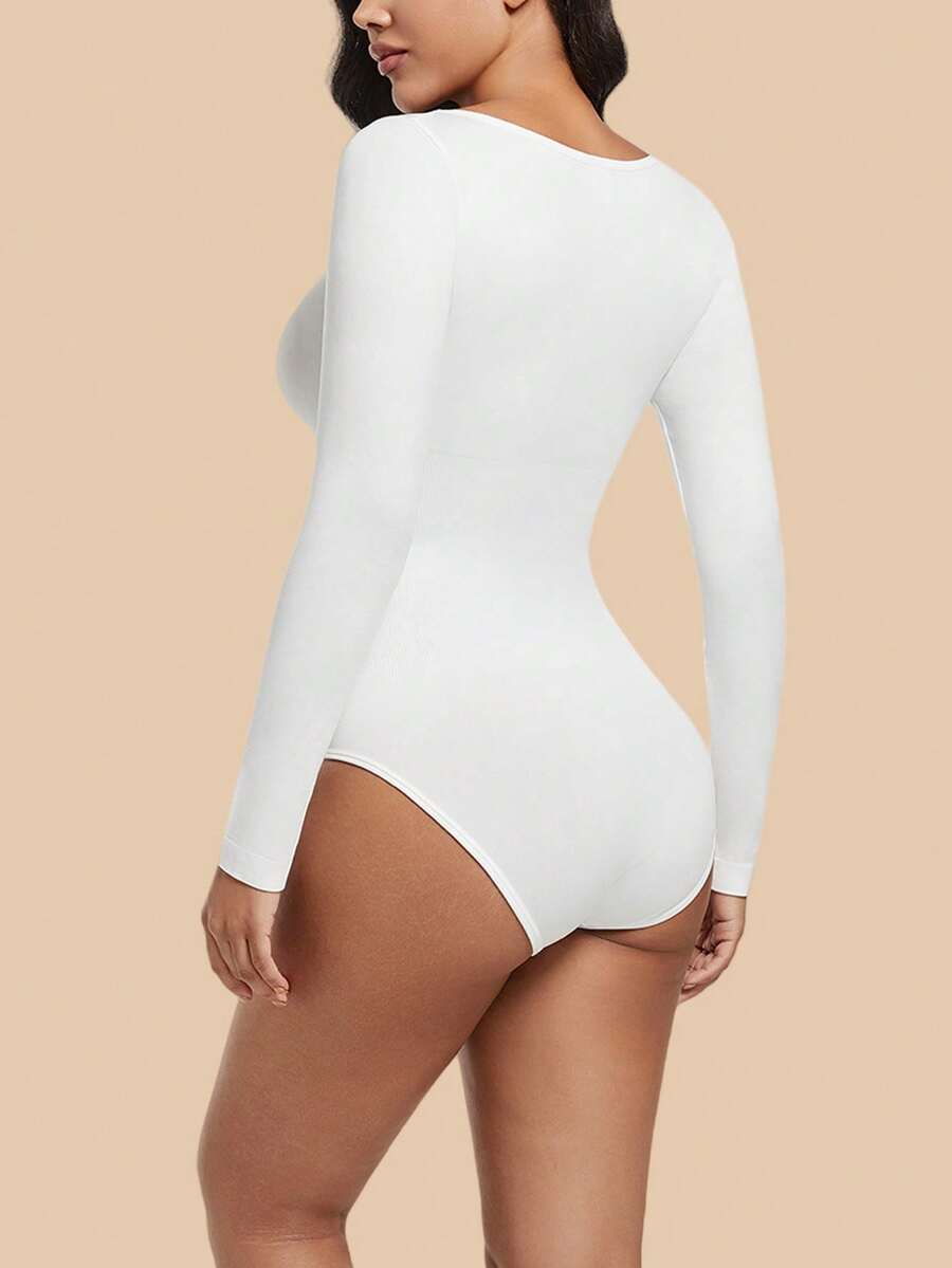 Women's black seamless bodysuit shapewear with tummy control and butt lift design.