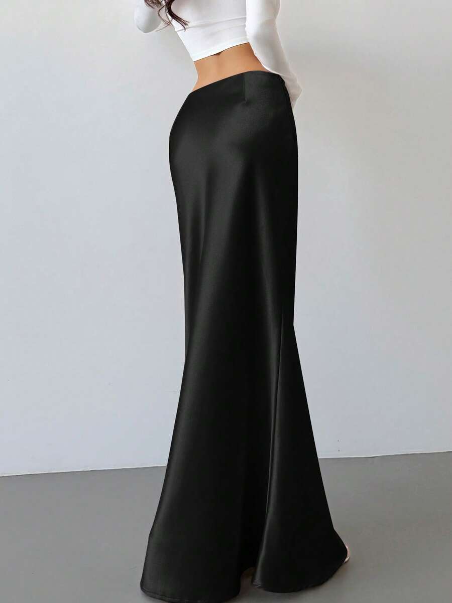 Elegant black satin high waist mermaid maxi skirt for women featuring a skinny fit and floor-length silhouette.