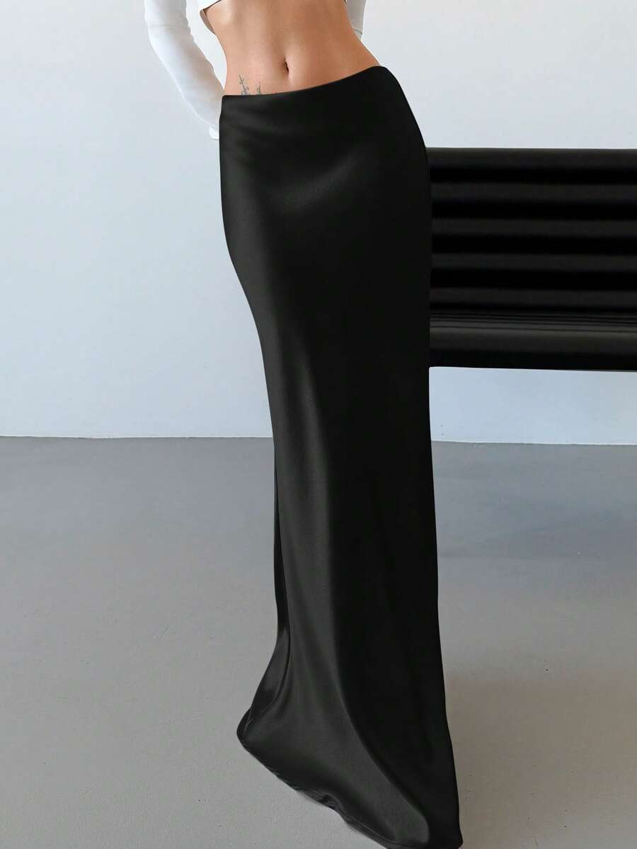 Elegant black satin high waist mermaid maxi skirt for women featuring a skinny fit and floor-length silhouette.