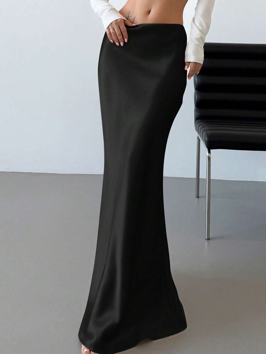 Elegant black satin high waist mermaid maxi skirt for women featuring a skinny fit and floor-length silhouette.
