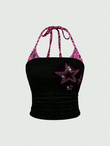 Black Y2K halter crop camisole top featuring a backless design, ruched detailing, and appliques for women.