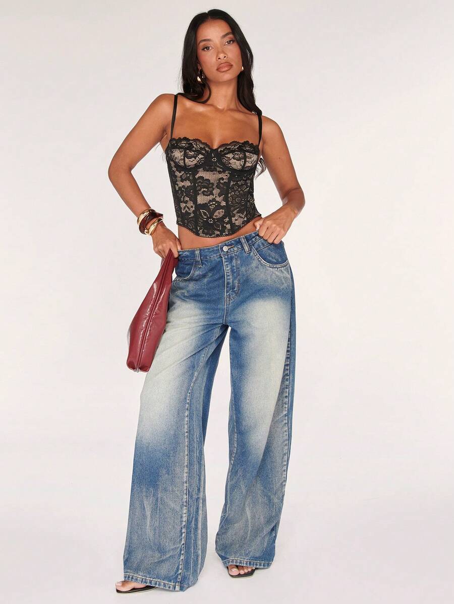 Women’s camisole top with cup detail, spaghetti straps, lined body, and slim fit design in knitted fabric with an asymmetrical hem.