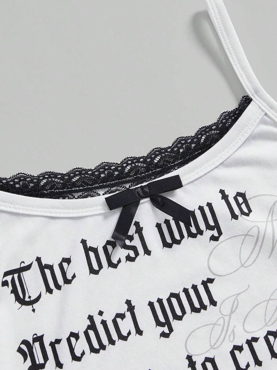 White crop cami top for women featuring spaghetti straps, contrast lace trim, bow detail, and frill trim.
