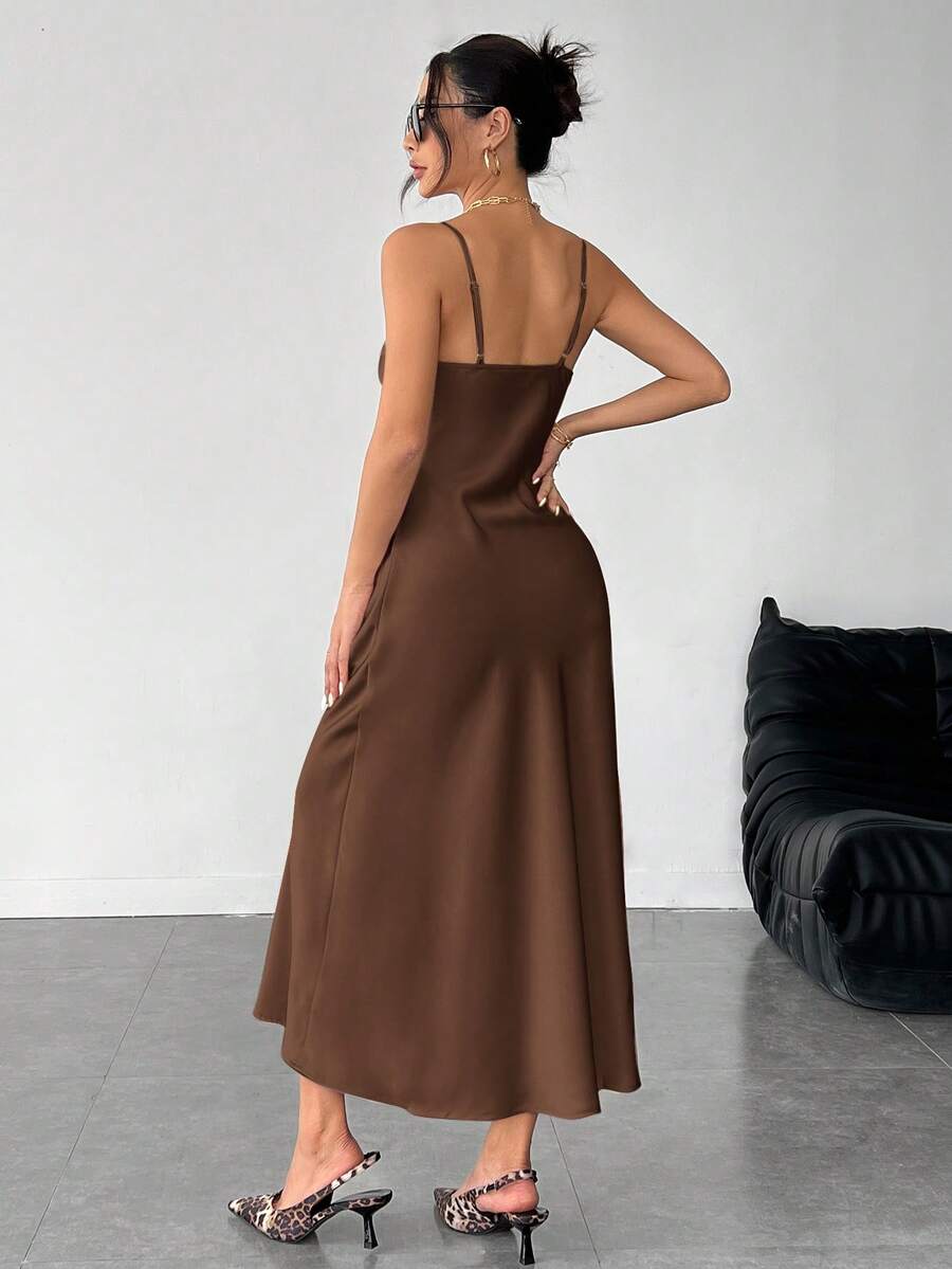 Women's long apricot satin cami dress featuring a draped swing collar, spaghetti straps, backless zipper back, and mermaid hem.