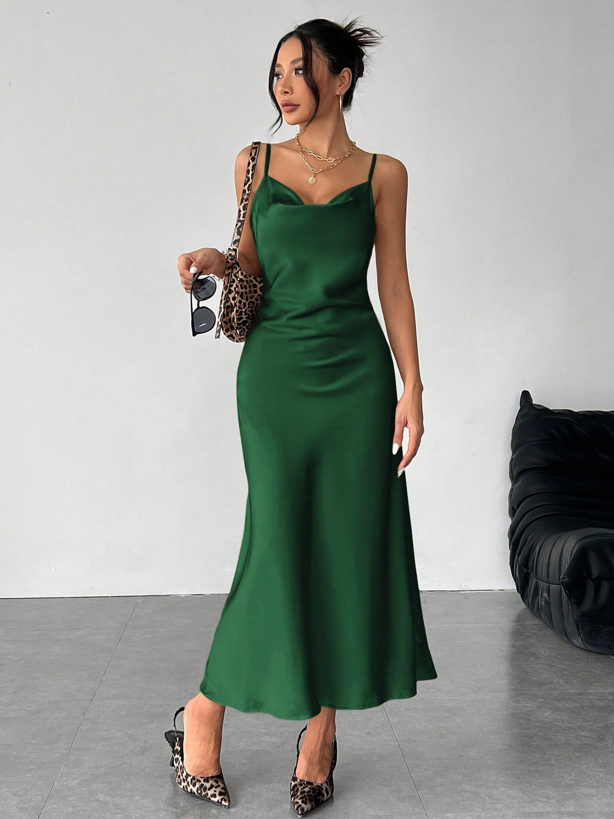 Women's long apricot satin cami dress featuring a draped swing collar, spaghetti straps, backless zipper back, and mermaid hem.