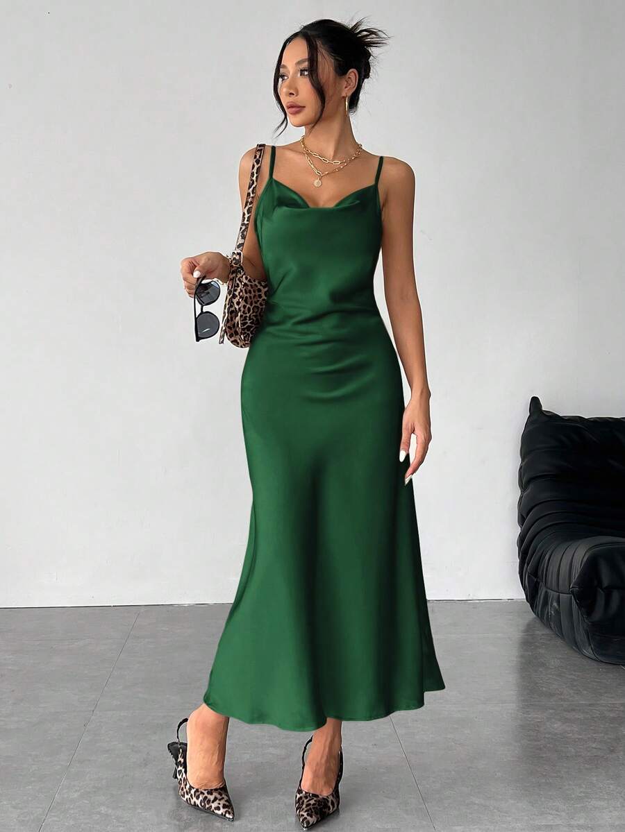 Women's long apricot satin cami dress featuring a draped swing collar, spaghetti straps, backless zipper back, and mermaid hem.