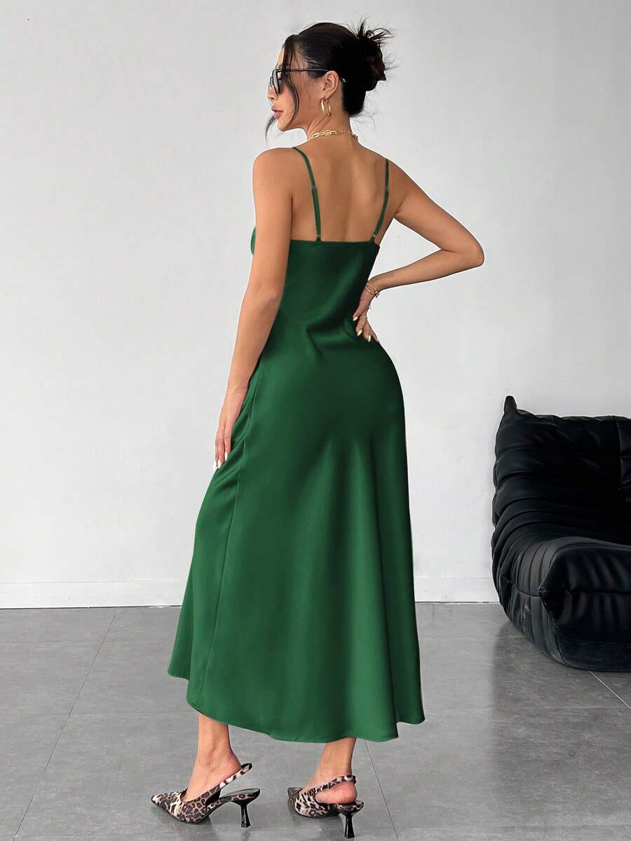 Women's long apricot satin cami dress featuring a draped swing collar, spaghetti straps, backless zipper back, and mermaid hem.