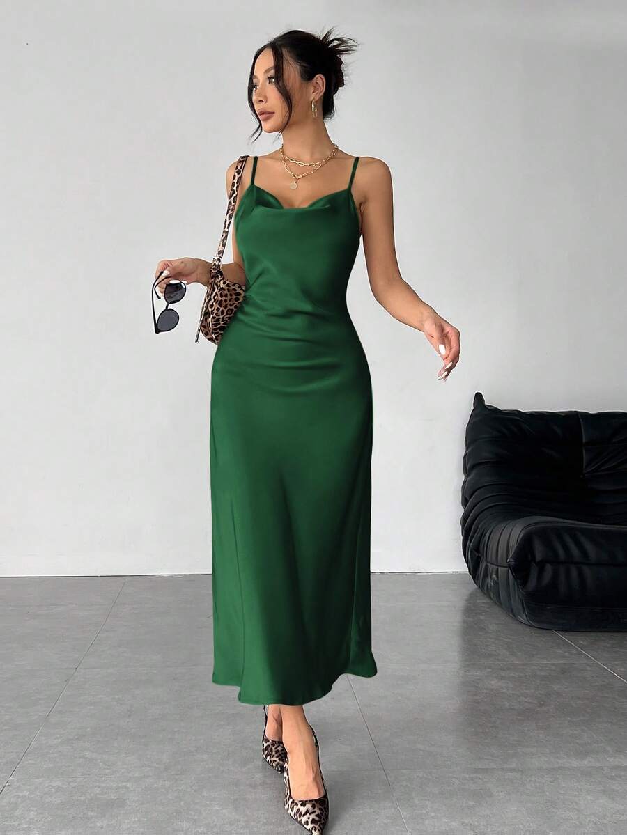 Women's long apricot satin cami dress featuring a draped swing collar, spaghetti straps, backless zipper back, and mermaid hem.