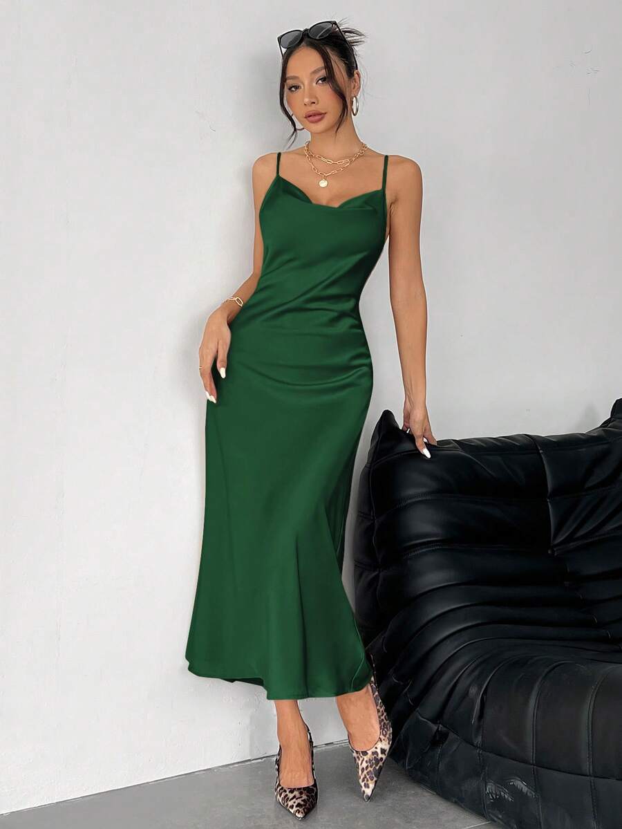 Women's long apricot satin cami dress featuring a draped swing collar, spaghetti straps, backless zipper back, and mermaid hem.