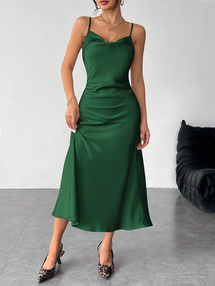 Women's long apricot satin cami dress featuring a draped swing collar, spaghetti straps, backless zipper back, and mermaid hem.
