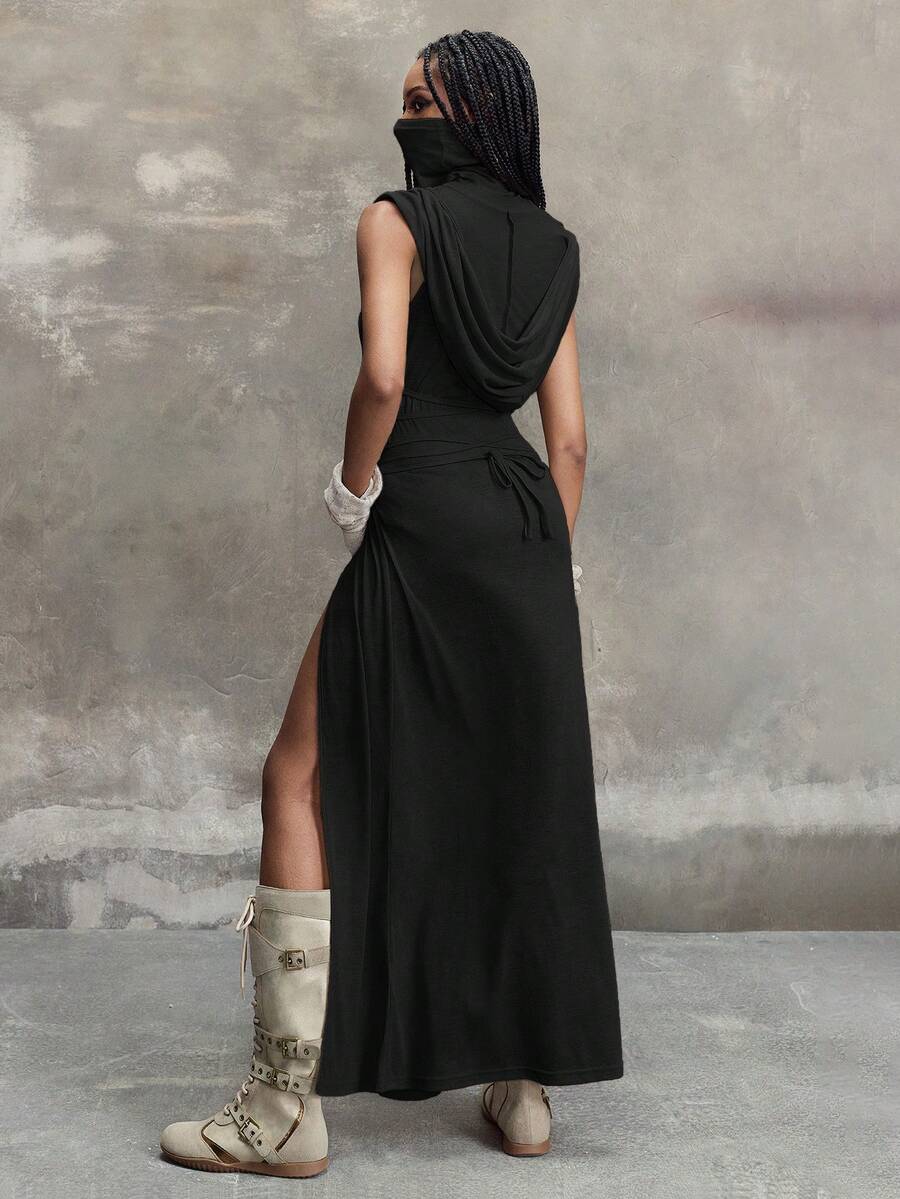 Women wearing a Y2K vintage apocalyptic style hooded long dress featuring short sleeves, backless detail, high thigh slit, and slim fit knitted fabric.