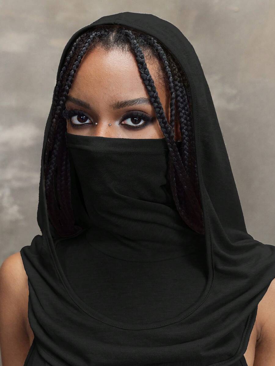 Women wearing a Y2K vintage apocalyptic style hooded long dress featuring short sleeves, backless detail, high thigh slit, and slim fit knitted fabric.