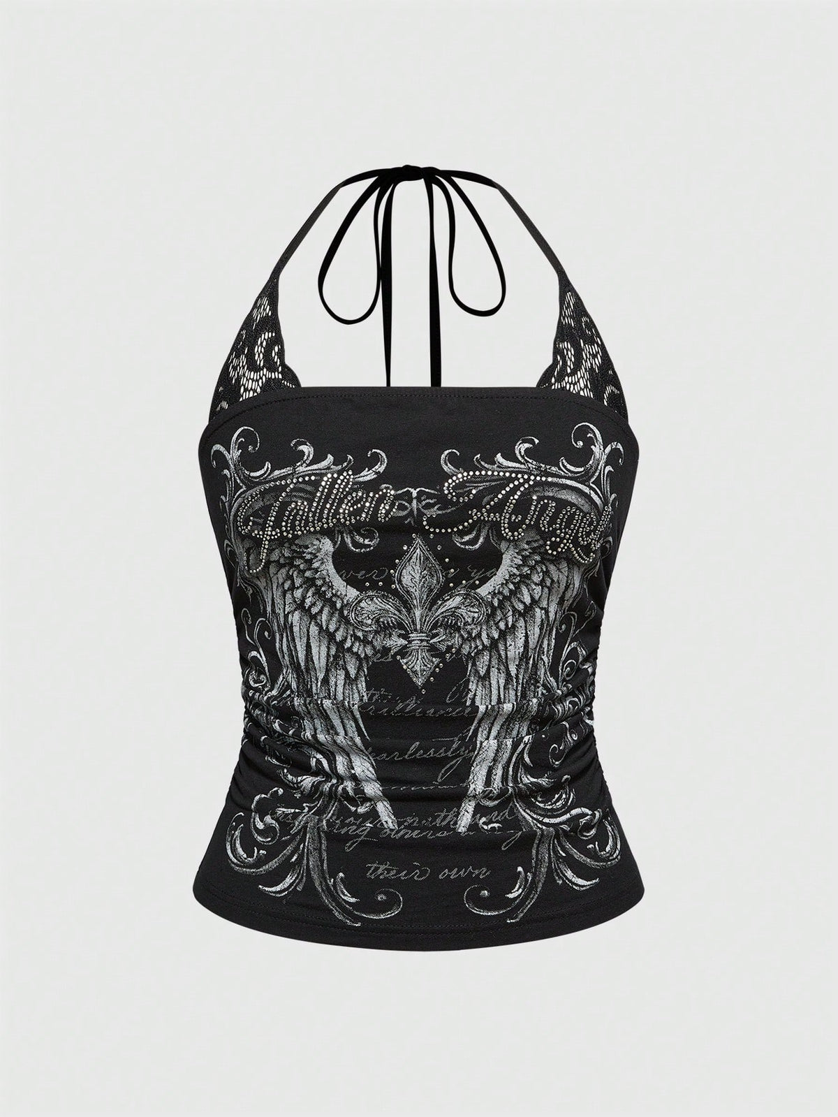 Woman wearing a black Y2K concert print 2-in-1 contrast lace halter crop top featuring a backless design with knot details.
