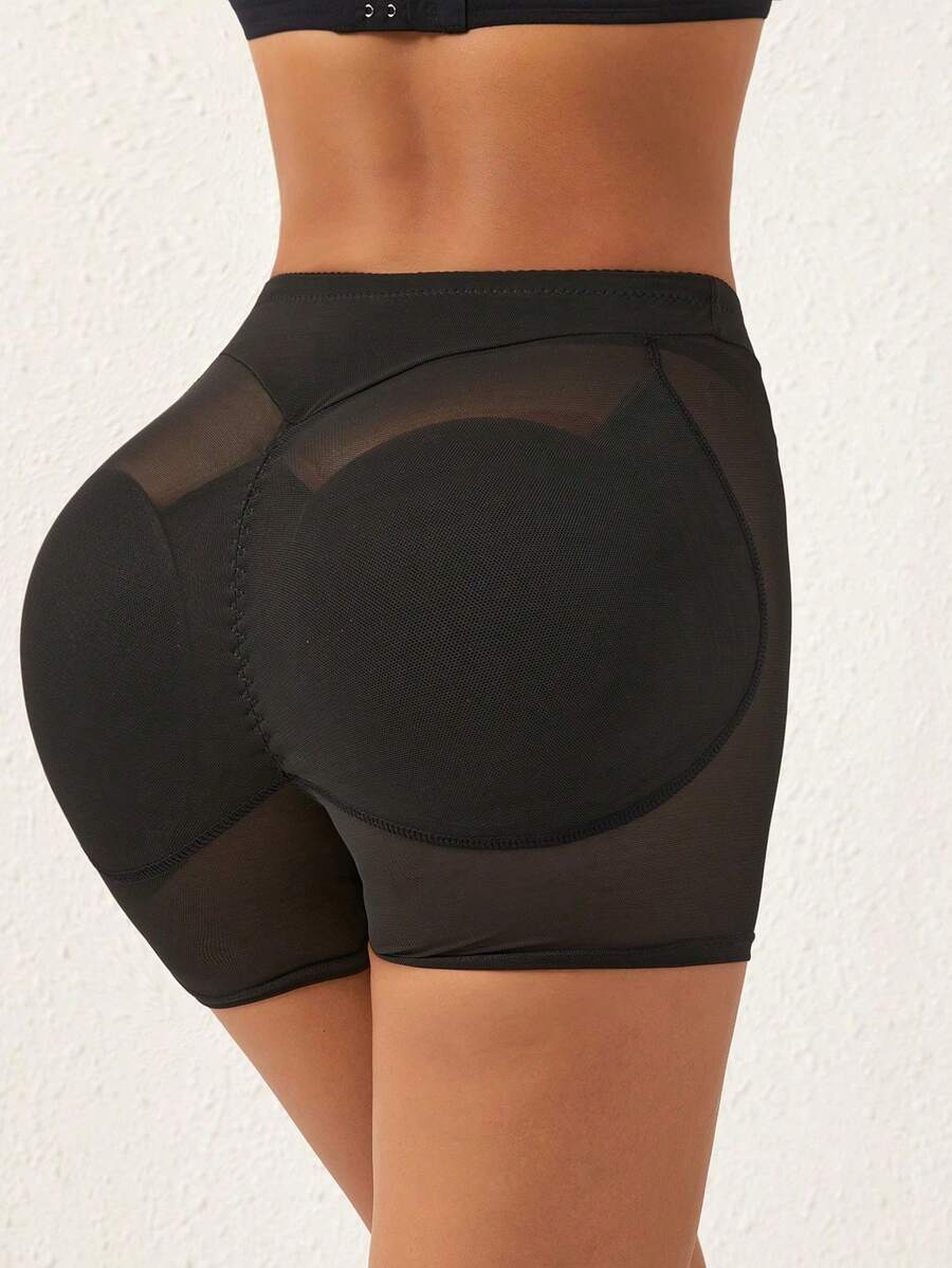 Apricot high-waist seamless butt lifting shapewear shorts with removable foam padding for women.