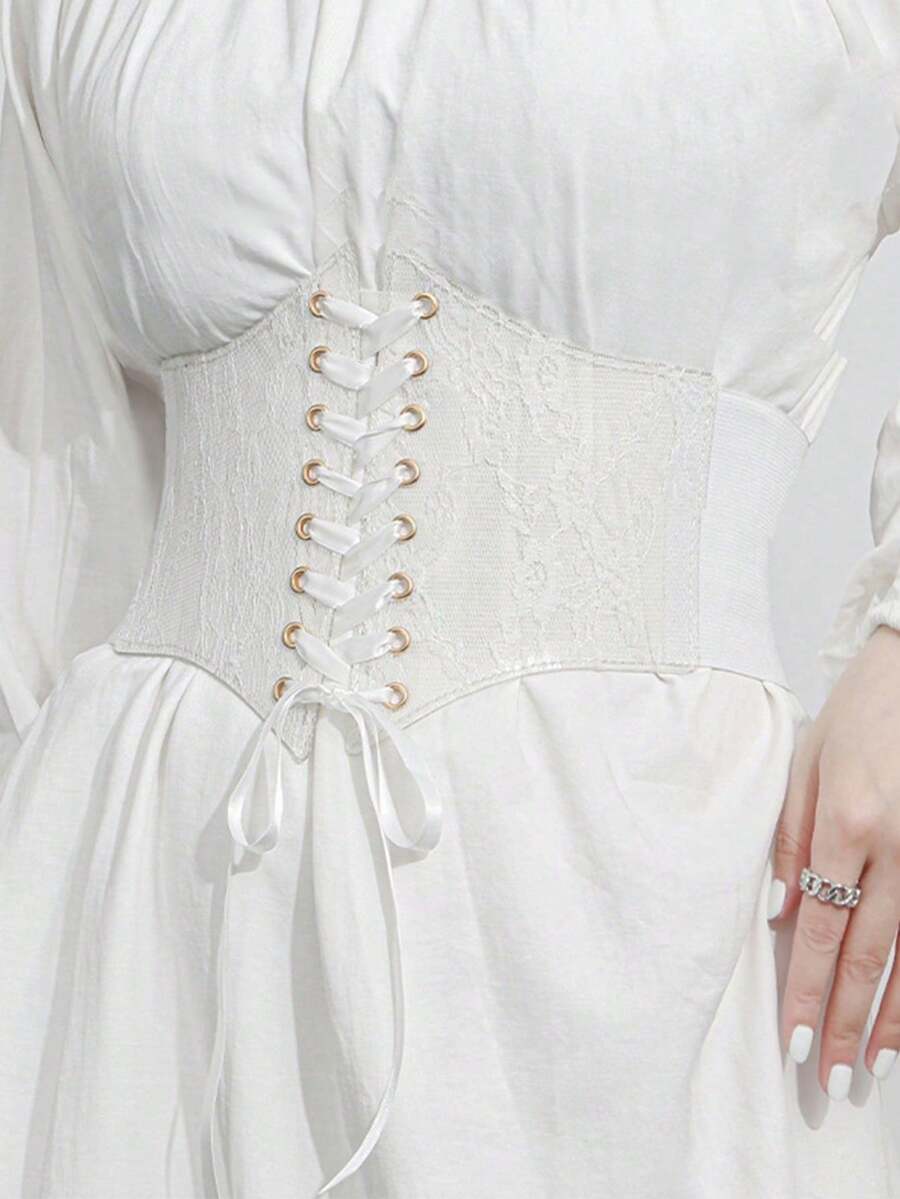 Black lace-up waist cincher with grommet eyelets, baroque pattern, medium stretch, and wide belt design for women.