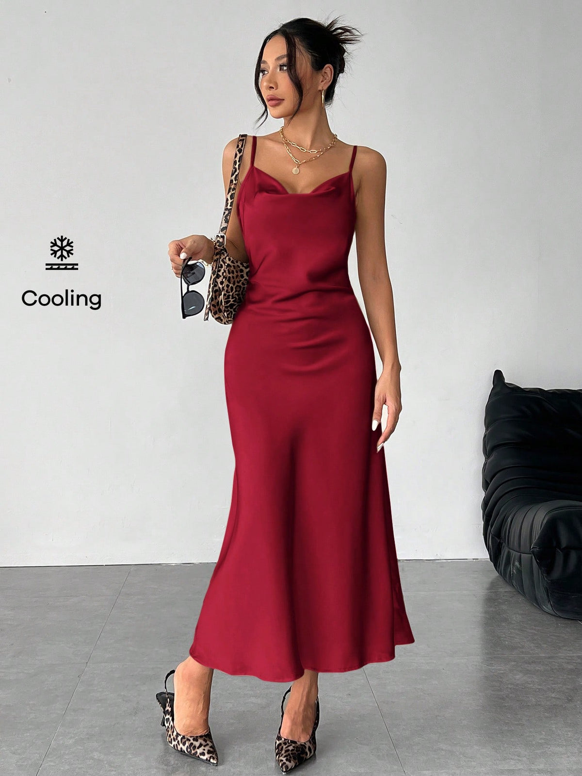 Women's long apricot satin cami dress featuring a draped swing collar, spaghetti straps, backless zipper back, and mermaid hem.