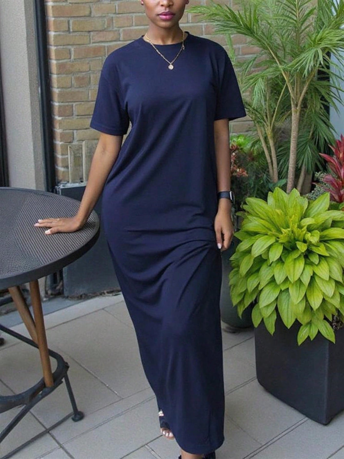 Women's apricot long bodycon dress with short sleeves, scoop neck, and side split hem.