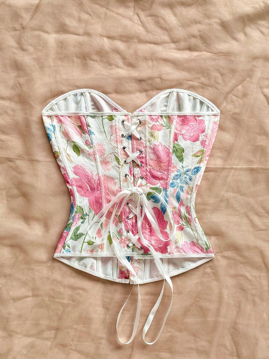 Women's apricot retro floral print bandeau crop top featuring a strapless asymmetrical neckline, lace-up back tie detail, and ruched slim fit woven fabric.