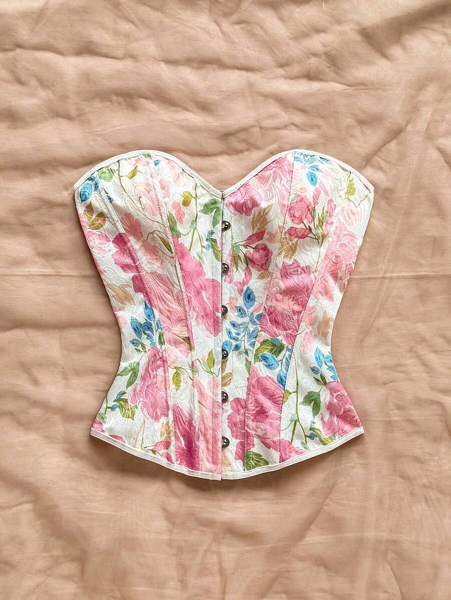 Women's apricot retro floral print bandeau crop top featuring a strapless asymmetrical neckline, lace-up back tie detail, and ruched slim fit woven fabric.