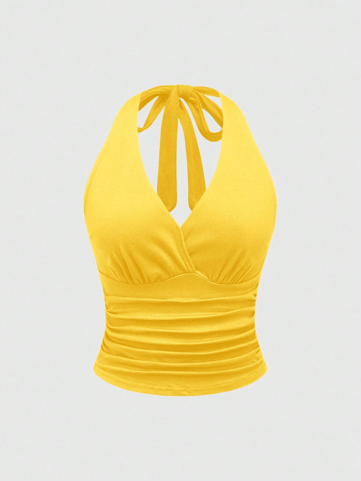 Women's halter crop tank top featuring a backless silhouette and ruched detailing in a slim fit design.