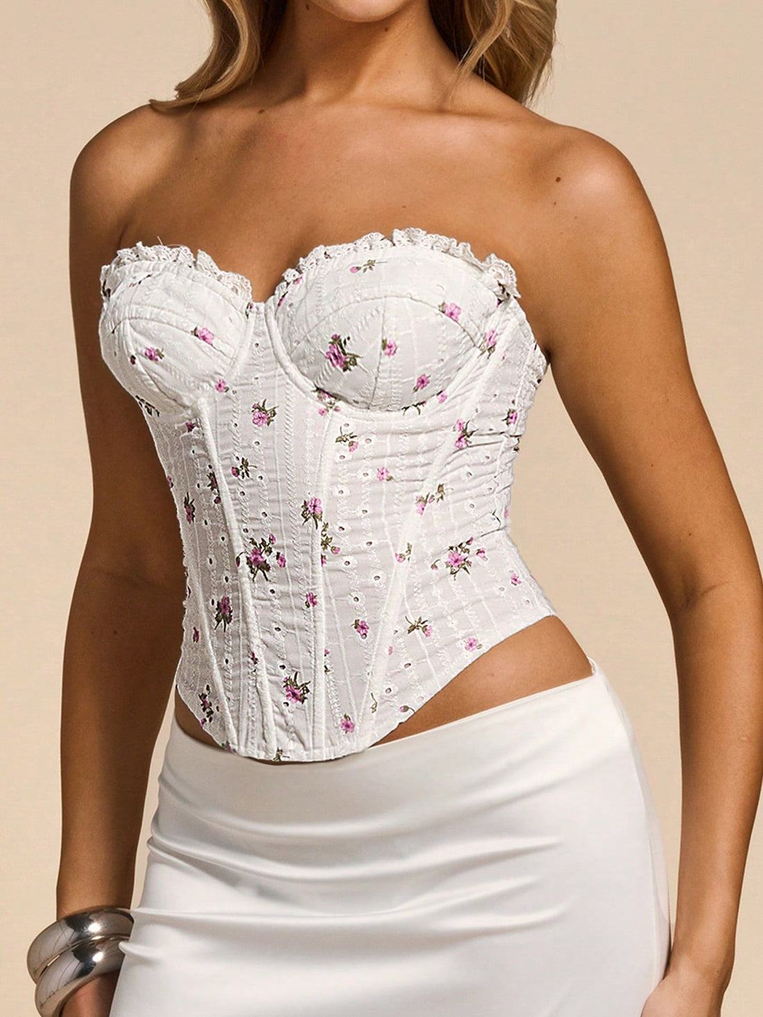 Women's white ditsy floral frill trim strapless corset tube top featuring a sweetheart neckline and lace-up back design