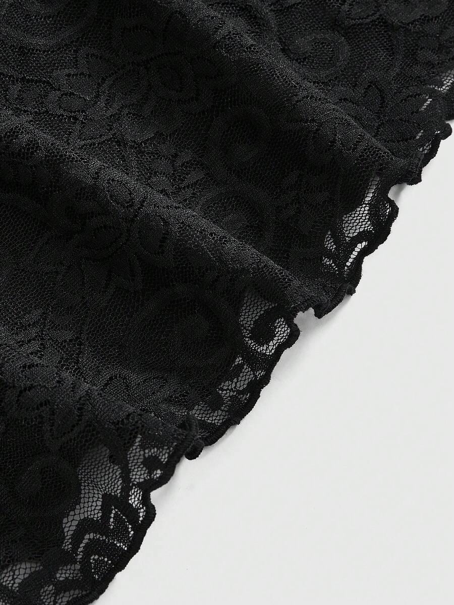 Women's black halter tank top with contrast lace trim, asymmetrical hem, backless ruched detailing, and slim fit.