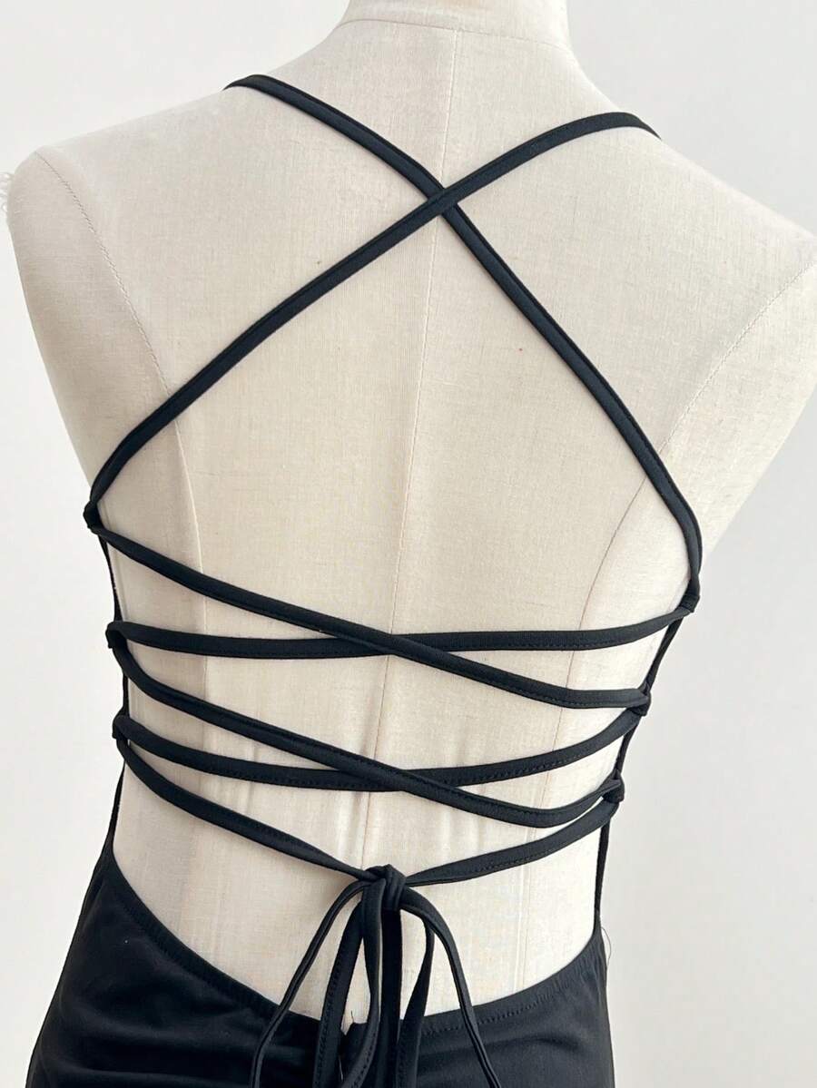 Women's backless sleeveless midi party dress with spaghetti straps and a high slit