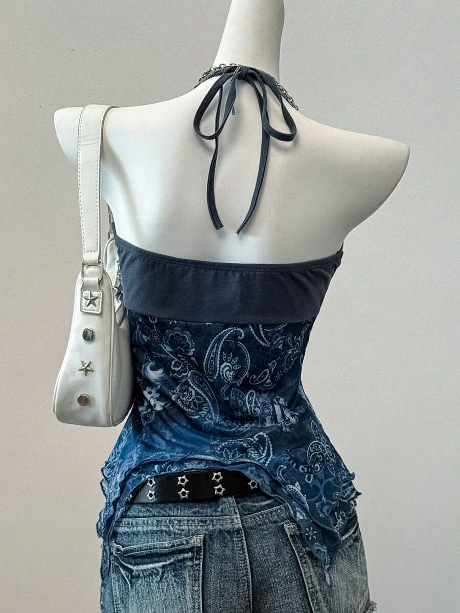 Women's backless halter cami top featuring a paisley print, sleeveless design, and an asymmetrical hem in knitted fabric.