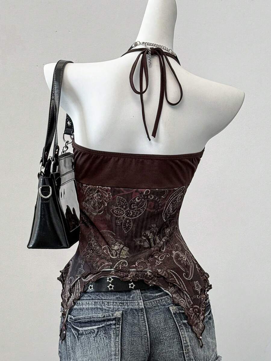 Women's backless halter cami top featuring a paisley print, sleeveless design, and an asymmetrical hem in knitted fabric.