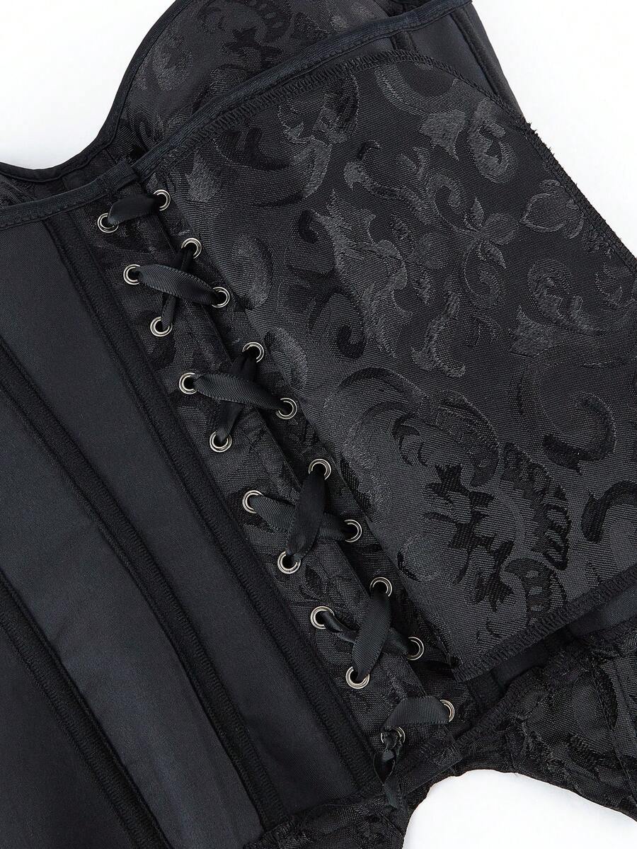 Black overbust corset top with strapless design, boned support, tie-back and zipper closure for women shapewear styling.
