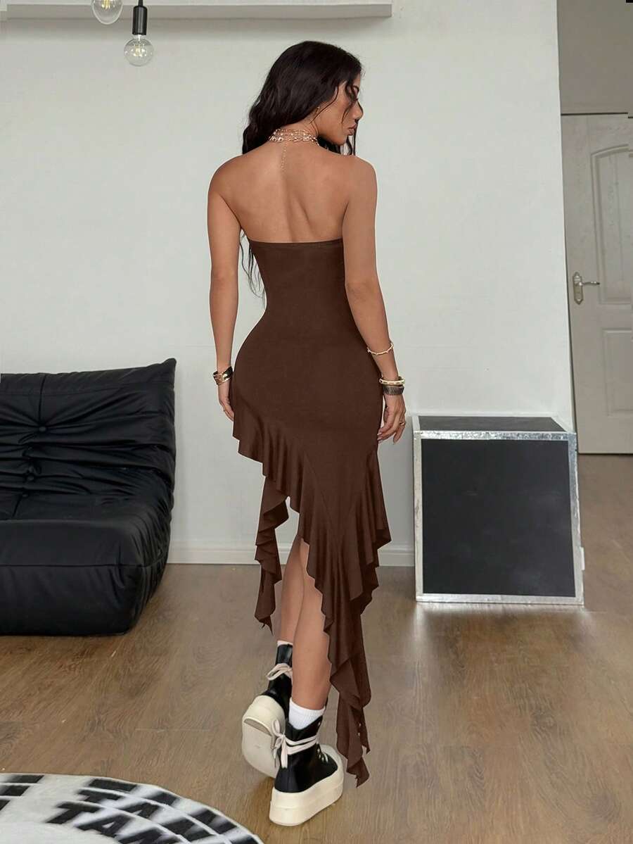 Women's strapless black bandeau midi dress featuring an asymmetrical ruffle hem and a slim fit bodycon silhouette.